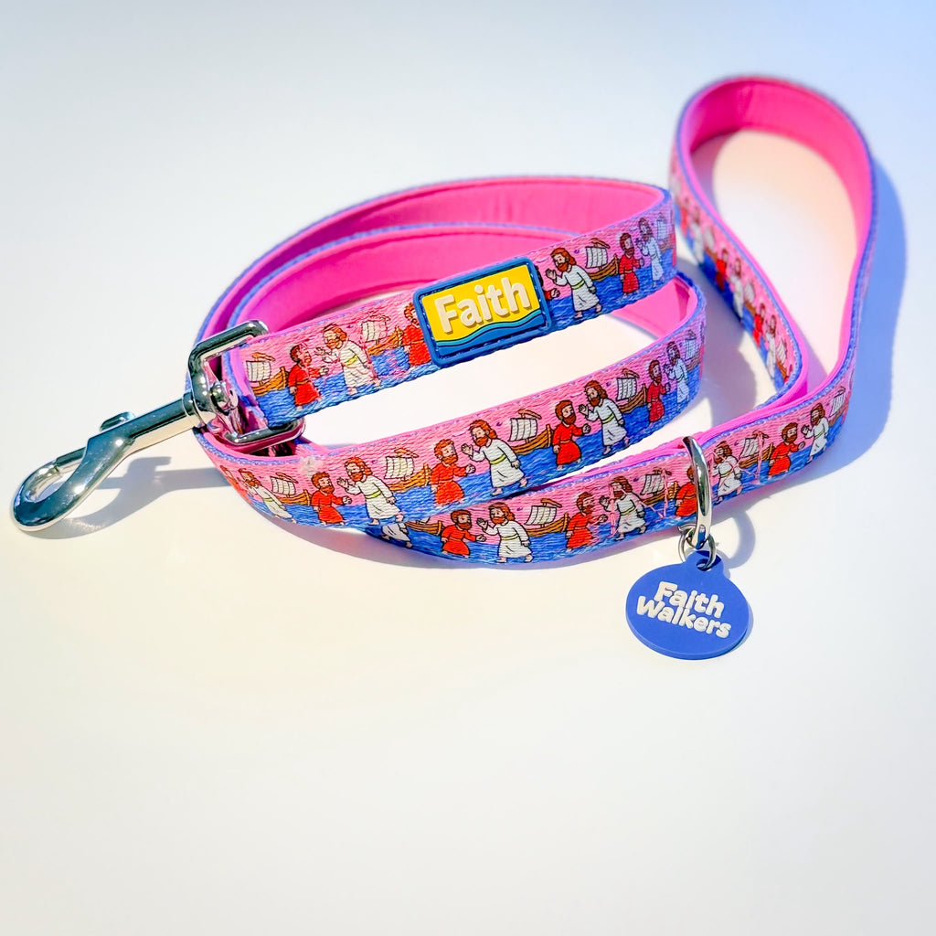 Pink Walk by Faith leash with a padded handle, silver clasp, yellow Faith patch and blue Faith Walkers tag.