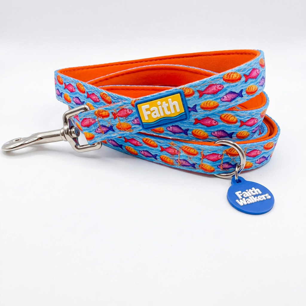 The Miracle of Loaves and Fishes dog leash with orange lining on a white background.